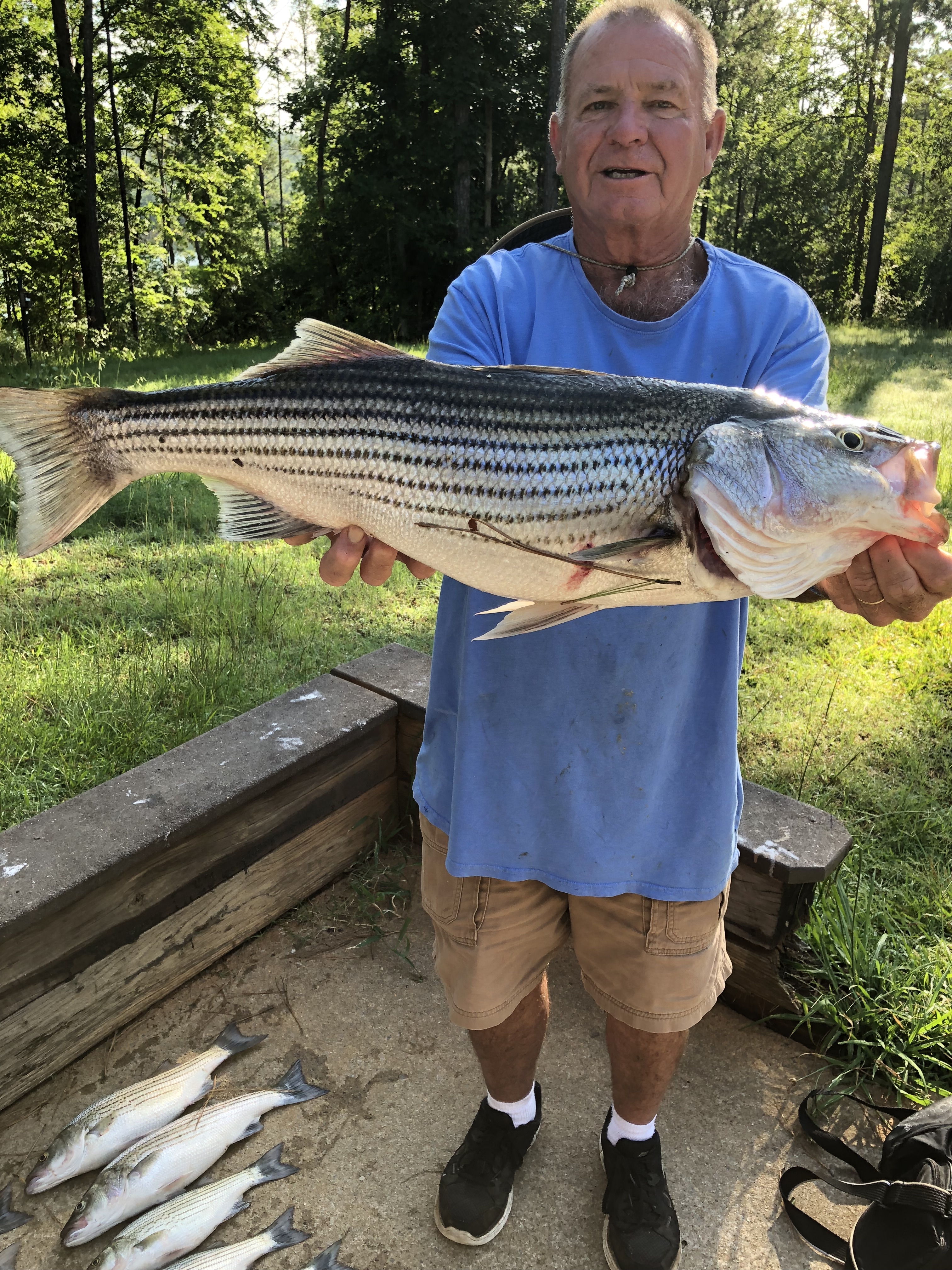 June 26, 2018Capt. Billy with his 12 pound StriperIMG_2238