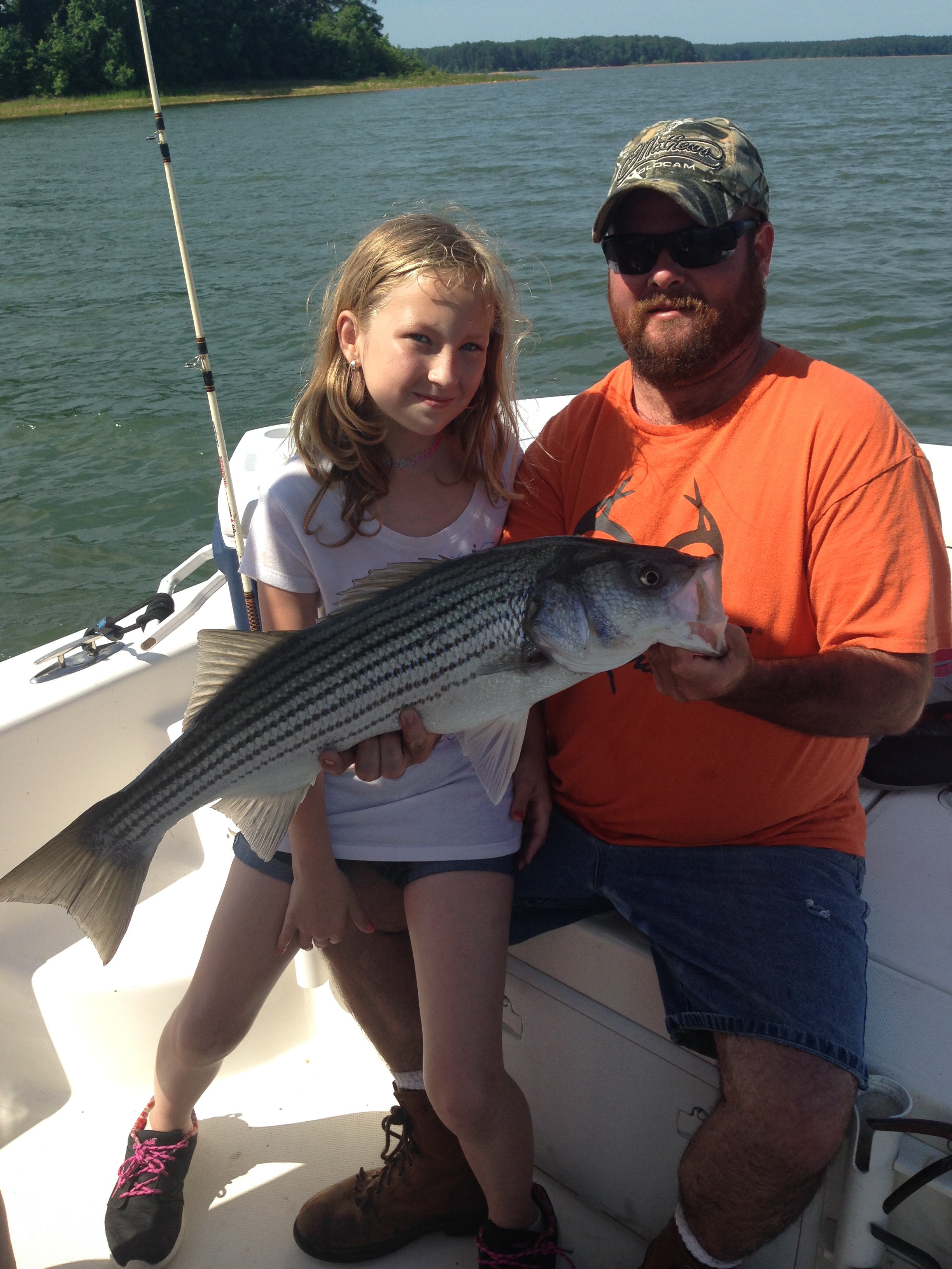 May 29,2017 Tiffant Barrow with her 15 pound striper Brad helping hold the striper.